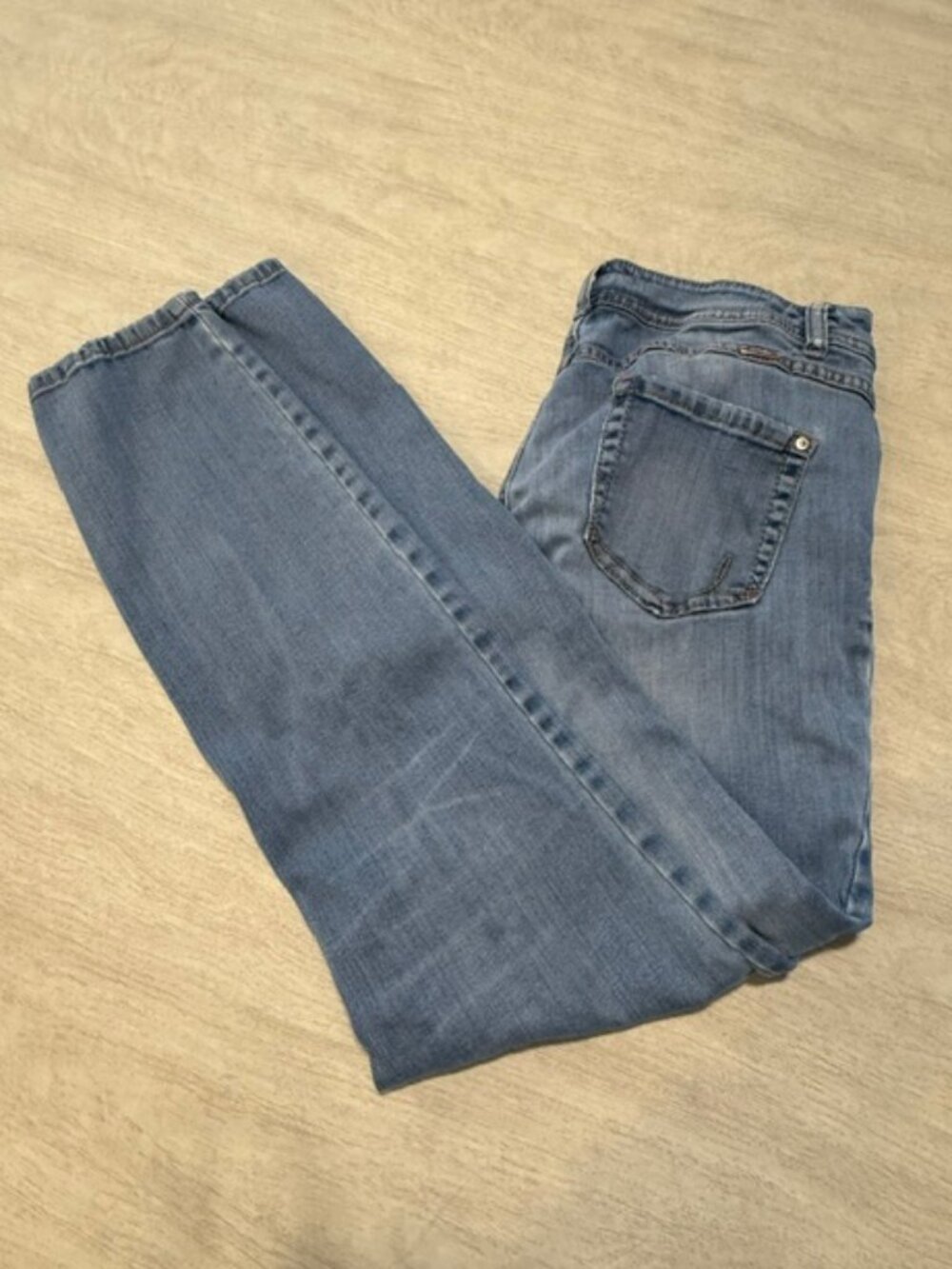 INC International Skinny Curvy blue denim jeans.